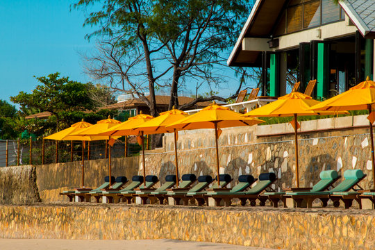 chairs and umbrella on stunning tropical beach in Hua Hin Thailand