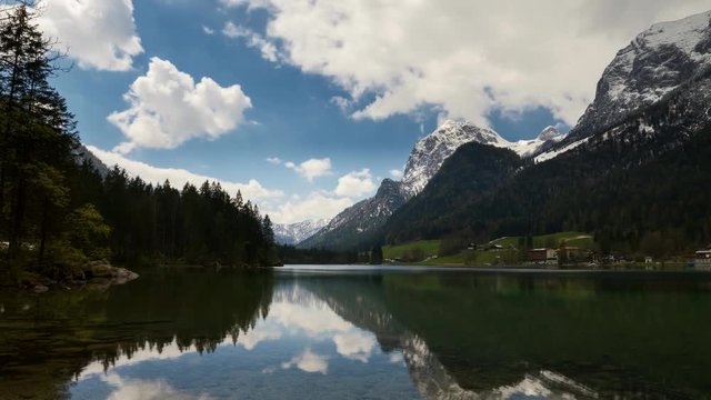 Time lapse - Moving clouds over lake Hintersee, Bavaria, Germany