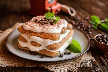 Traditional delicious Tiramisu cake served on a plate