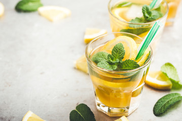 Homemade iced lemon sweet tea with mint