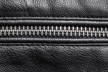 Black leather metal zipper fashion background. © Paweł Michałowski