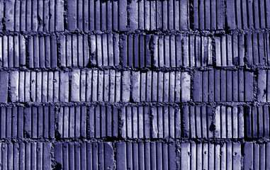 Blue color grungy brick wall pattern.