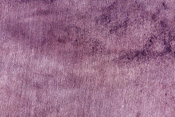 Dirty violet textile rag texture.