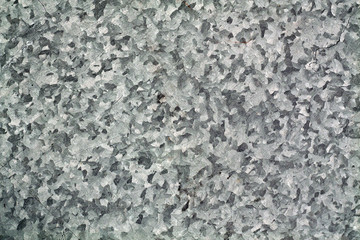 Gray color scratched metal panel.