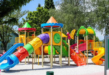 Park for children, slides, tunnels, mazes, in all colors, happy children, children's games