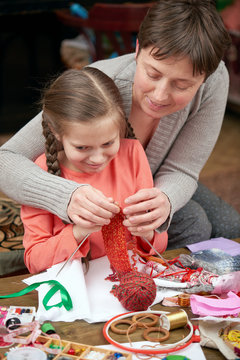 mother and child girl knit, handmade and handicraft concept