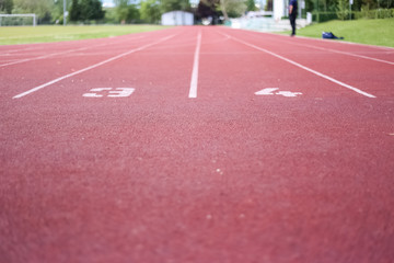 Athletic running track, sports, recreation, healthy life, sunny day