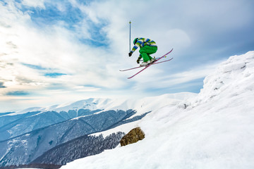 Good skiing in the snowy mountains, Carpathians, Ukraine. Good winter day, incredible ski jump. Ski...