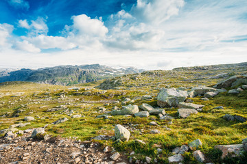 Fototapeta na wymiar Mountains Landscape With Blue Sky In Norway. Travel In Scandinavia