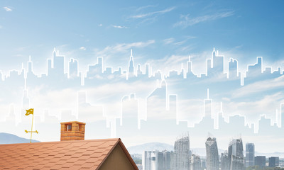 Concept of real estate and construction with drawn silhouette on big city background