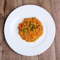 Vegetarian food on  plate with wooden background