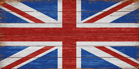 UK flag painted on old wooden planks background