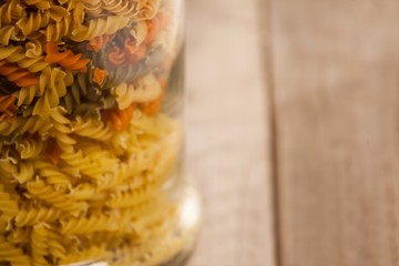 Girandole pasta in a glass container