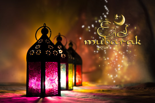 Eid Mubarak Ramadan Kareem muslim islamic holiday background with arabic oriental eid lantern or lamp and mosque