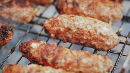 Barbecue grilling shish kebab. Clos up view.