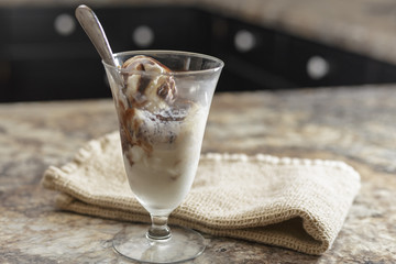 vanilla ice cream covered with chocolate syrup