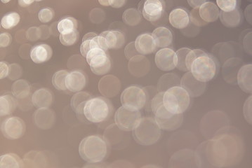 brown bokeh blurred abstract light festive background 