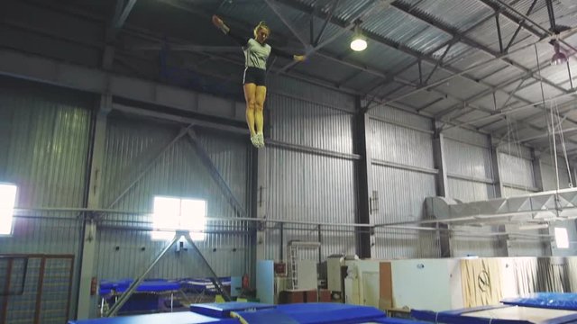 Athlete jumping on the trampoline
