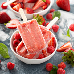 Strawberry and raspberry popsicles