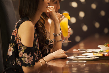 The ladies laughing happily at the bar