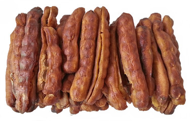 Tamarind seedless on white background.Sweet tamarinds seedless is food good taste as fruits as...