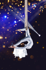 Young woman circus air gymnast © Andrey Burmakin