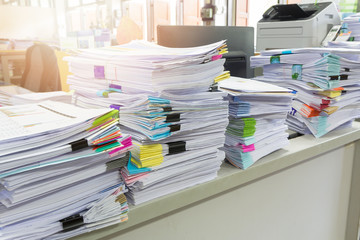 Pile of unfinished documents on office desk, Stack of business paper