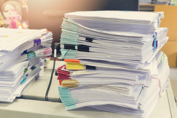 Pile of unfinished documents on office desk, Stack of business paper