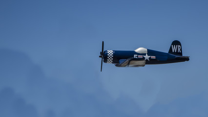 Toy Corsair Military Plane Flying High