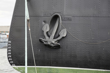 Fragment of the ship's side with an anchor © i_valentin