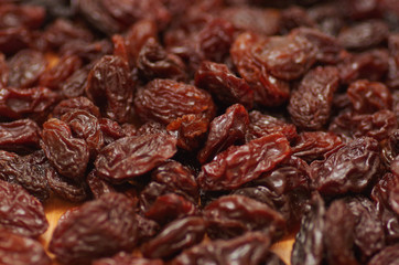 Delicious raisins as background Grape Raisin texture