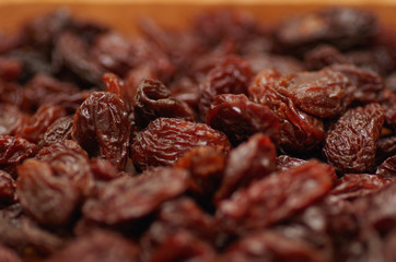 Delicious raisins as background Grape Raisin texture