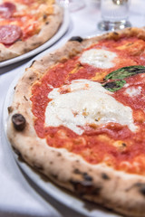 A typical italian pizza served in a restaurant