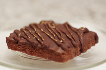 Closeup of a delicious fresh chocolate cookies on wooden desk