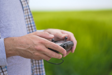 Smart farming concept, farmer using drone in field