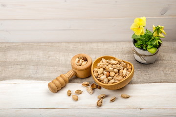 Almonds on wooden background