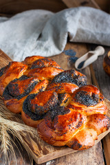 Traditional Jewish bread with poppy seeds, selective focus