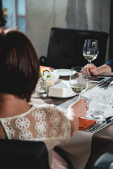 woman at the food and wine pairing going to try white wine