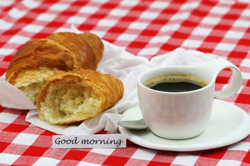 Good morning card with cup of coffee and French croissant broken in half
