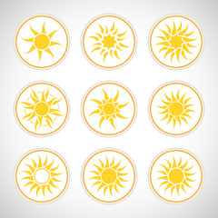 Set of abstract yellow sun icons.