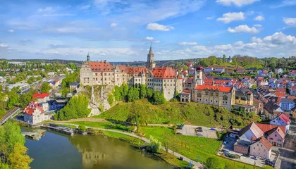 Papier Peint photo Château Panoramic aerial view on Sigmaringen castle located on the side of Danube river in Sigmaringen, Baden-Wurttemberg, Germany