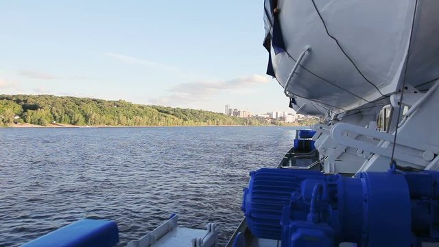 Lifeboat on board a passenger steam-ship on the Volga river. Full HD stock footage shot at summer season time.
