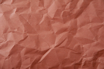 Fototapeta premium Crumpled red paper texture