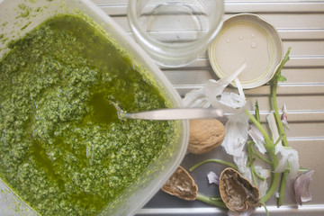 preparing homemade pesto sauce