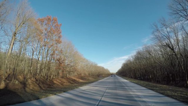 Dashcam Footage From an Elevated Position on a Rural Highway in the US State of Kentucky During Winter.