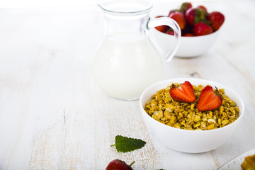 Granola and smoothies with strawberry