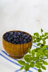 Blueberries in a wooden bowl