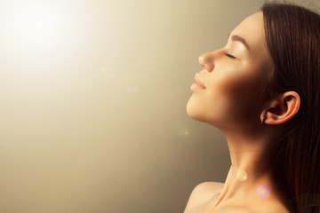 health, spa and beauty concept - close up of face of beautiful young woman. copyspace