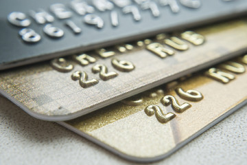 Gold and platinum credit cards close up
