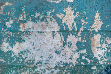 chipped paint on an old plaster wall, texture background
